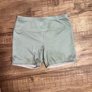 Green biker shorts